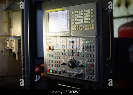 Industrial CNC equipment control panel, automated production line control Stock Photo