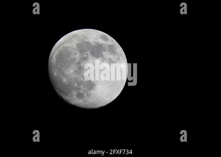 Full moon isolated on the black background Stock Photo