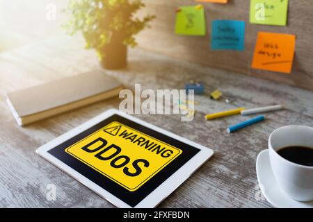 DDoS attack detection message. Virus and Hacking. Cyber security and internet concept. Stock Photo