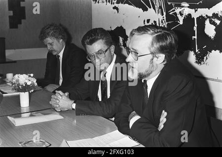 Van Dijk (r) receives booklet on the law of private equity from author mr. drs. A. A. M. Dolle, December 10, 1985, The Netherlands, 20th century press agency photo, news to remember, documentary, historic photography 1945-1990, visual stories, human history of the Twentieth Century, capturing moments in time Stock Photo