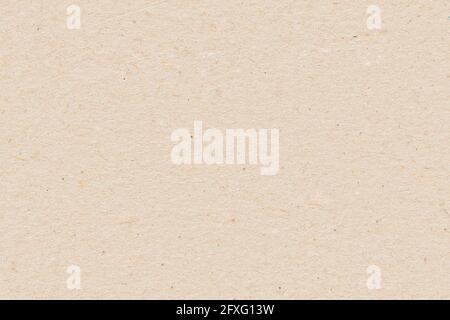 Cardboard background. Neutral flecked cardboard texture, seamless and tileable repeat pattern for an endless scrolling template Stock Photo