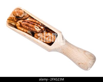 top view of shelled pecan nuts in wooden scoop cutout on white background Stock Photo