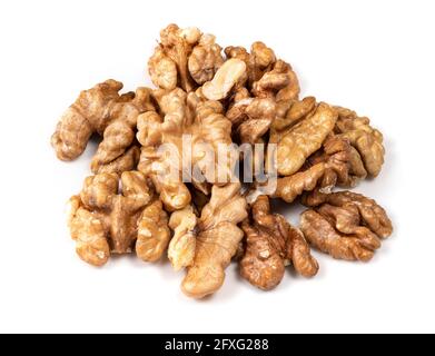pile of shelled walnuts closeup on white background Stock Photo