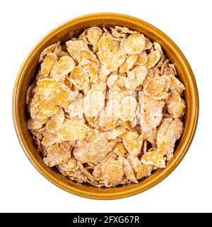 top view of sugar-coated cornflakes in round bowl cutout on white background Stock Photo