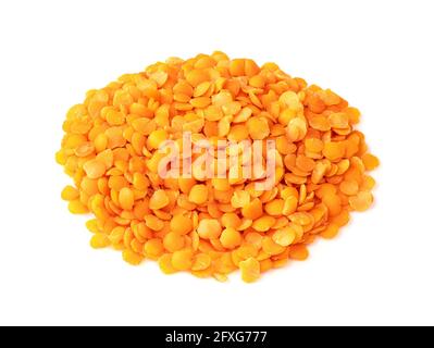 handful of split red lentils closeup on white background Stock Photo