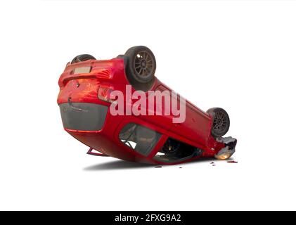 Upside down car isolated on white after an accident Stock Photo