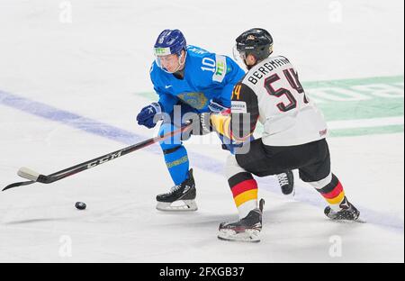 Lean Bergmann #54 of Germany compete, fight for the puck against  Nikita Mikhailis #10 of Kazakhstan   GERMANY - KAZAKHSTAN  IIHF ICE HOCKEY WORLD CHAMPIONSHIPS Group B  in Riga, Latvia, Lettland, May 26, 2021,  Season 2020/2021 © Peter Schatz / Ģ����ý Live News Stock Photo
