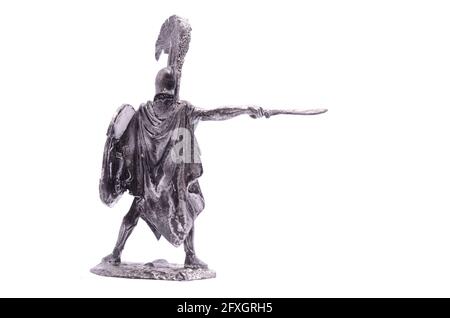 tin soldier Spartan warrior with sword and shield isolated on white Stock Photo