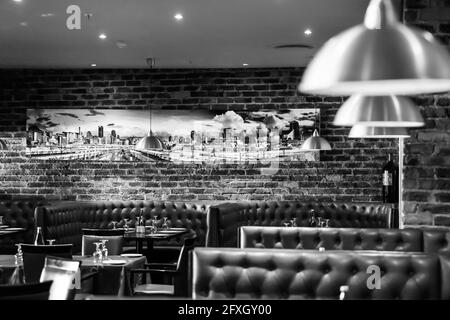 JOHANNESBURG, SOUTH AFRICA - Jan 05, 2021: Johannesburg, South Africa - August 07 2013: Interior of Booth Style Restaurant Diner with Brown Interior Stock Photo