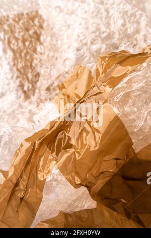 Plastic trash with bubble wrap and adhesive tape. Crumpled rubbish Stock Photo