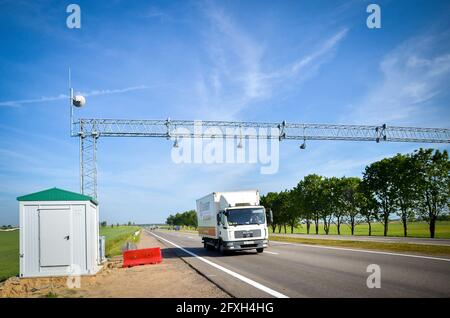 BELARUS: 25.06.2013 - Road toll. Gate with barriers by toll road on a highway.  Stock Photo