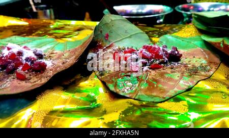 banarasi pan, betel nut garnished with all indian banarasi ingredients for sale Stock Photo