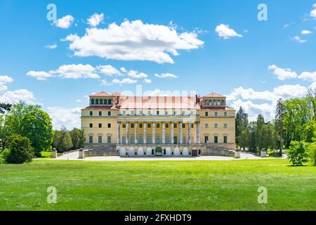Esterhazy castle in Eisenstadt, Burgenland region. Rear view to the famous landmark, museum and event location from the public Schlosspark during a su Stock Photo