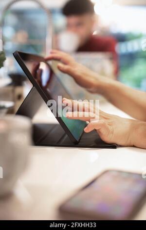 Close up man using digital tablet Stock Photo