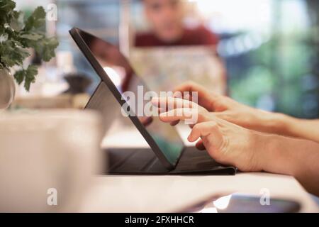Close up man using digital tablet Stock Photo