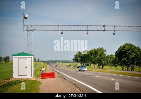 BELARUS: 25.06.2013 - Road toll. Gate with barriers by toll road on a highway.  Stock Photo