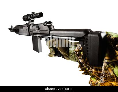 Isolated photo of first person view arm holding sniper rifle in guillie suit on white background. Stock Photo