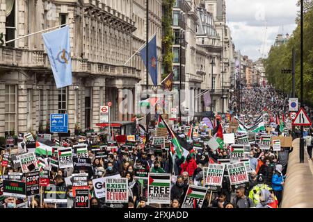 Large crowd of protesters marching on road, Free Palestine Protest, London, 22 May 2021 Stock Photo