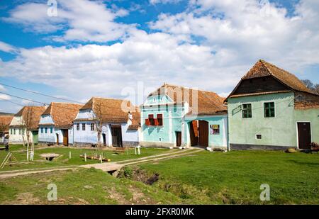 Colourful houses in Viscri, UNESCO World Heritage Site, Transylvania, Romania, Europe Stock Photo