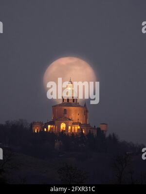 Moon rise behind the San Luca Basilica, Bologna, Emilia Romagna, Italy, Europe Stock Photo