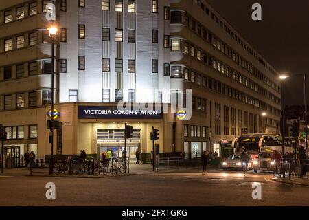 Entrance to Victoria Coach Station at night, London, UK