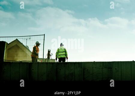 workers on a construction site Stock Photo