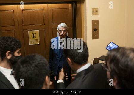 Washington, United States. 27th May, 2021. Senator Rob Portman (R-OH) talks to reporters as he boards an elevator for the Senate floor to vote at the US Capitol in Washington, DC on Thursday, May 27, 2021. Senators will vote on infrastructure and a January 6th commission. Photo by Sarah Silbiger/UPI Credit: UPI/Alamy Live News Stock Photo