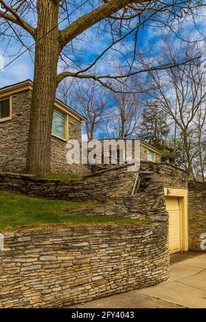 306 Park Avenue, orignially the 2nd personal residence of Earl Young, architect of the Mushroom Houses in the 20th Century, Charlevoix, Michigan, USA Stock Photo