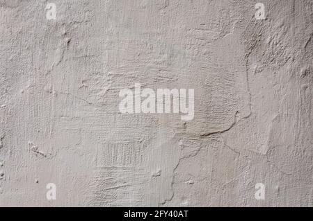 Concrete And Cement. Background High Detailed Fragment Stone White Wall. Dirty Cracked Plaster Texture. Grunge texture background Stock Photo