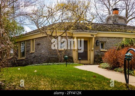 306 Park Avenue, orignially the 2nd personal residence of Earl Young, architect of the Mushroom Houses in the 20th Century, Charlevoix, Michigan, USA Stock Photo