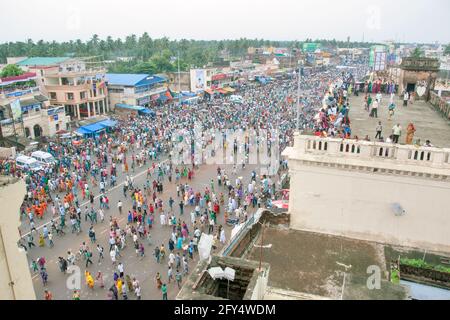 The picture shows an aerial view of Grand Road in Puri city. The picture was taken during the ratha yatra procession. Stock Photo