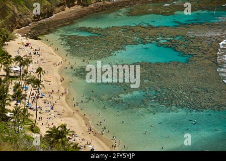 Aerial of calm, turquoise tropical waters and coral reef, Hanauma Bay, a top tourism destination for snorkeling swimming, Oahu, Honolulu, Hawaii, USA Stock Photo