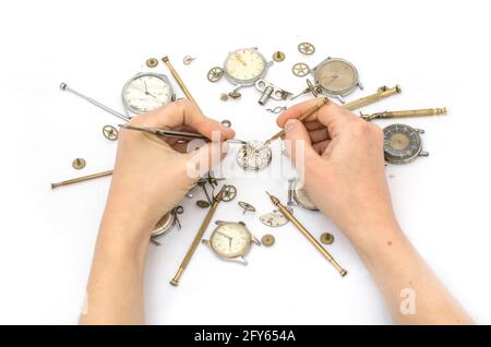 Repair of mechanical watches isolated on white Stock Photo