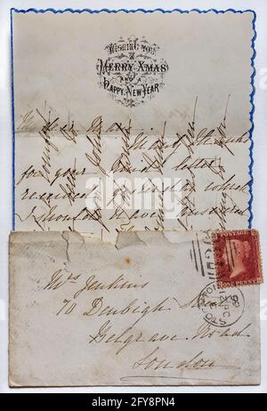 Victorian Christmas and New Year greetings letter mailed in 1866 and written in "cross writing" or "cross hatching" to save paper and postage. Stock Photo