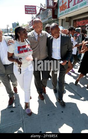Harlem, NY, USA. 27th May, 2021. (Guest, Bronx Borough President Ruben Diaz Jr, and Eric Adams walk as New York City Mayoral Candidate Eric Adams receives the endorsement of Civil Rights Activist Ashely Sharpton, Director, National Action Network Youth Huddle and daughter of Civil Rights Activist Rev. Al Sharpton in the Harlem section of New York City on May 27, 2021. Credit: Mpi43/Media Punch/Alamy Live News Stock Photo