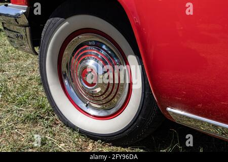 Marble Falls, Texas, USA. April 10, 2021. Whitewall tires and chrome hubcap on a vintage Mercury Monterey. Stock Photo