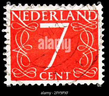 MOSCOW, RUSSIA - SEPTEMBER 23, 2019: Postage stamp printed in Netherlands shows Numeral, Numbers serie, circa 1953