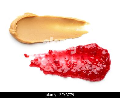 peanut butter on knife Stock Photo by magone