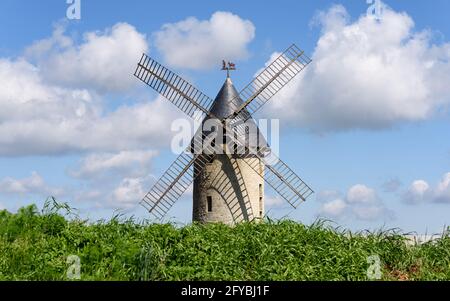 The old windmill of Largny-sur-Automne aka 'Moulin de Wallu' on a sunny day. Formerly used to grind cereal grain into flour, mainly wheat. Stock Photo