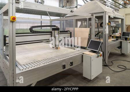Automatic CNC drilling machine for making molds, computerized industrial equipment. Stock Photo