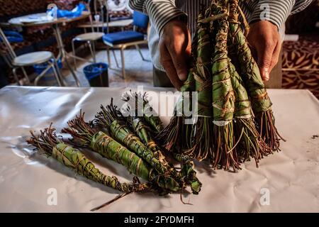 Camden ,London, UK. The drug Khat on the table in local Somali cafe. The drug mainly used by Somalians becomes illegal in the UK. Stock Photo