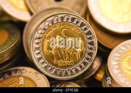 A slogan of Egypt’s Medical Staff 2020 on the reverse side of Egyptian one pound coin In appreciation of the Egyptian medical staff efforts COVID-19 Stock Photo