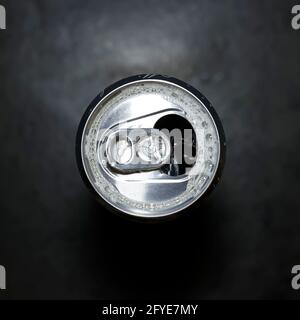 view of the top of a soda can with black background Stock Photo