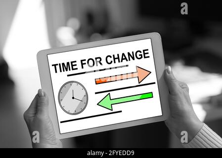 Time for change concept shown on a tablet held by a woman Stock Photo
