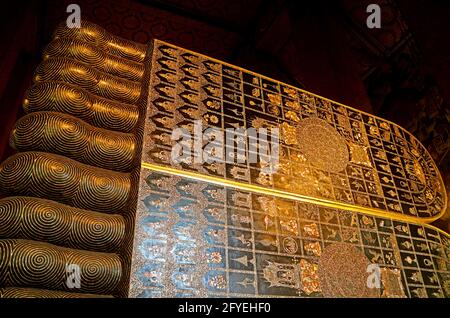 Soles of Reclining Buddha's Feet Inlaid 108 Auspicious Symbols with Mother of Pearl, Wat Pho Temple, Bangkok, Thailand Stock Photo