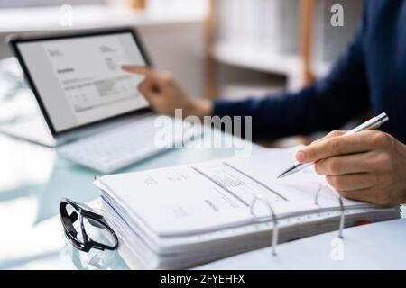 Accountant Calculating E Invoice Tax Bill And Receipt Stock Photo