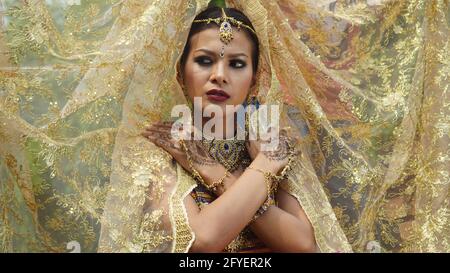 Closeup on women face in traditional dress sari Stock Photo