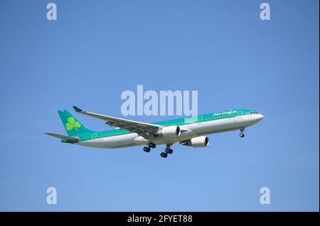 Aer Lingus Airbus A330-302 With The Aircraft Registration EI-FNG In The Approach To The Northern Runway 08L Of The Munich Airport MUC EDDM Stock Photo