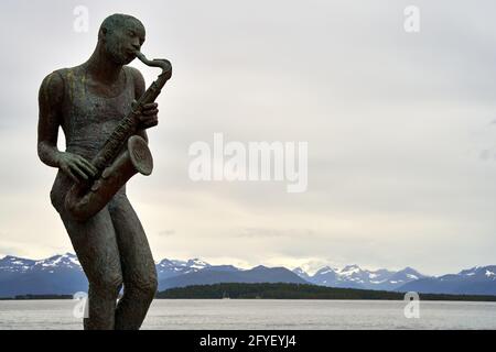 MOLDE, NORWAY - Jul 26, 2020: The Jazz Boy is a bronze statue on Torget in Molde made by Nina Due. The statue was given to the city in connection with Stock Photo