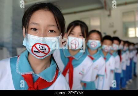 Handan, Handan, China. 28th May, 2021. On May 28th, Chunguang Primary School in Congtai District, Handan City, Hebei Province launched the theme activity ''To be a young guard against smoking cessation'', calling on people to stay away from tobacco and promote a healthy lifestyle through non-smoking sign masks, non-smoking handwritten newspapers, and non-smoking performance art., To create a smoke-free growth environment for children to welcome the arrival of ''World No Tobacco Day'' on May 31. Credit: SIPA Asia/ZUMA Wire/Alamy Live News Stock Photo